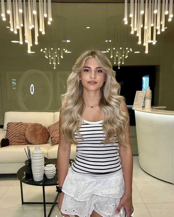 Client after a haircut and blow-dry at the Studio Marcela hair salon